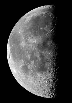 the moon is shown in black and white