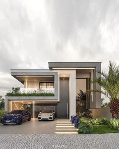 two cars parked in front of a modern house