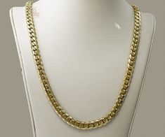 Very impressive solid 14K gold authentic Miami Cuban link chain. Made by a Cuban American artist, who specialized in hand crafting Cuban links for over two decades. All our 14K gold Cuban links are made from 14K Plumb (14K+ pure) gold, with ultra high polished finish. Chain looks even better in person! Chain Specs: - 24 inches long. - 7mm wide. - Weight approximately 99.8 grams of solid 14K yellow gold. This is a custom made Cuban links chain listing, and the indicated weight is approximate. The Black Side Bag, Cuban Link Necklace, Miami Cuban Link Chain, 18k Gold Bracelet, Miami Cuban Link, Link Chain Necklace, Cuban Link Chain, Cuban Link, Pure Gold