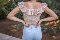 Get ready to look effortlessly chic in our Cropped Striped Top! This tan and striped top features a cropped length and ruffle sleeves, perfect for pairing with your favorite high-waisted bottoms. The smocked bodice adds a touch of fun and flirty to your look. Stay on trend with this versatile and stylish top! -Fits true to size, size up for added length -100% cotton Striped Crop Top For Day Out, Chic Striped Summer Crop Top, Chic Cropped Ruffle Crop Top, Chic Striped Crop Top For Summer, Chic Ruffled Crop Top For Brunch, Chic Cropped Smocked Top For Summer, Chic Striped Crop Top For Day Out, Feminine Ruffled Crop Top For Vacation, Chic Cotton Crop Top With Ruffles