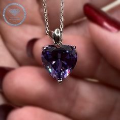 This Purple Diamond Heart Necklace is a thoughtful gift for a special someone. Handcrafted with 925 Sterling Silver and a 5 carat created heart cut purple diamond, it's sure to sparkle. Add a touch of glamor to any ensemble. Chain Size : 18 " (45.7 cm) including the clasp Pendant Size : 1.2 cm (5 Carat) Main Stone Color : Purple Main Stone: Created Diamond Main Stone Shape : Heart Cut Metal : Real Solid 925 Sterling Silver Hallmark : 925 Stones Setting : Prong Finish : High Polished Guaranteed H Diamond Heart Necklace, Purple Diamond, Heart Necklace Diamond, Diamond Gift, Purple Heart, Diamond Pendant Necklace, Diamond Heart, Stone Settings, Solid 925 Sterling Silver