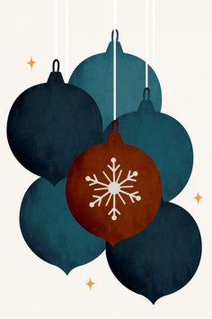 three christmas ornaments hanging from strings with snowflakes on them