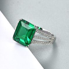 This beautiful ring feature a emerald, sure to add a splash of color to any look. Features This ring in sterling silver has a classic and luxurious design that is perfect for any occasion. Made all by hand! It truly deserves a spot in every jewelry collection. Beautifully crafted, this style is sure to become a treasured keepsake. It is made of 925 sterling silver. Made to last a lifetime, strong and durable! Strict health standards guarantee your everyday wearing. Lead-free, cadmium-free, nicke May Birthstone Rings, Emerald Wedding Rings, Color Lab, Emerald Wedding, Emerald Cut Rings, Lab Created Emerald, Pave Engagement Ring, May Birthstone, 925 Ring