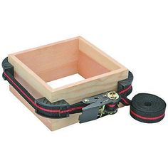 a wooden box that has some tools in it