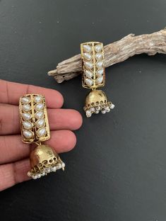 This Unique pair of Earrings is designed and crafted at PraNiCollectioNs  PraNiCollectioNs is the place for anyone who Is in lookout for a latest trend with an ethnic touch.  We at PraNiCollectioNs offers a great range of Indian Ethnic jewellery's. We are strongly committed to  Prasoviding our customers  some uniquely handcrafted Produs with utmost satisfaction. These jewellery's are made from high quality  material which are Hypoallergenic and are also free from corrosion and rusting This listi Gift Brass Jhumkas With Latkans, Ceremonial Jhumkas With Latkans, Traditional White Brass Earrings, Brass Jhumkas For Diwali Gift, Brass Jhumkas For Festival Gifts, Diwali Gift Brass Bridal Earrings, Diwali Gift Bridal Brass Earrings, Ceremonial Brass Jhumkas With Latkans, Brass Jhumkas Gift For Diwali