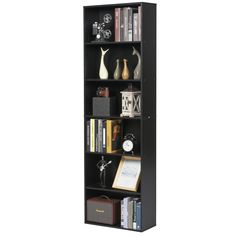 a black bookcase with books and other items on top of it, against a white background