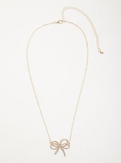 FIT Measures 19” long and 5” extender. MATERIALS + CARE Base metal and stone. . Imported. DETAILS Bow shaped pendant. Rhinestone studded. . High shine finish. . The best plus size women's rhinestone bow necklace - gold tone necklaces in gold. Torrid is your destination for cozy fall and winter clothes to keep you warm and comfortable.