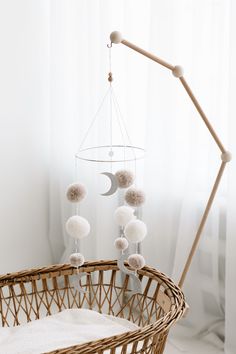 Decorate your little one's crib with exquisite craftsmanship and cozy vibes! Our TISU handmade wool pom pom mobile adds an irresistible charm, ensuring sweet dreams for your baby. Get yours today and introduce a touch of soft allure to their tiny abode! 🐑🌙💤 #TISUMobile #HandmadeLove #BabyCribDecor#goodvibes #mood #bonnenuit #sleeptight #craftsman #cribmobile #babynursery #decorative #bedtime Gender Neutral Baby Shower Themes, Moon Nursery, Baby Shower Inspiration, Baby Crib Mobile, Nursery Crib