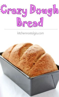 a loaf of bread in a pan with the words, crazy dough bread on it