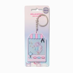 a keychain with an image of a pink unicorn on it's front