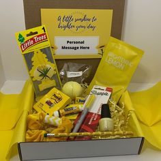 a yellow box filled with lots of goodies for someone's special message here