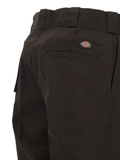 Dickies work pants in dark brown polyester with thick loops, concealed zip and hook closure, side pockets, two back welt pockets, a branded log patch at the back, mid-rise waist, fade and wrinkle resistant, straight leg and slim fit. Composition: 65% Polyester; 35% Cotton Dickies Work Pants, Dickie Work Pants, Italian Luxury Brands, Margiela Shoes, Italian Outfits, Green Shoes, Heritage Brands, Work Pants, Oversized Shirt