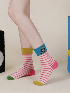 Embrace playful charm with our Cartoon Penguin Striped Socks. Featuring adorable penguin motifs nestled among classic stripes, these socks add a touch of whimsy to your outfit. Crafted from soft and breathable material, they provide all-day comfort and style. Whether you're lounging at home or stepping out for a casual day, these socks are the perfect accessory to showcase your love for penguins. Treat yourself to the cuteness of our Cartoon Penguin Striped Socks and add a fun flair to your sock Cartoon Penguin, Boho Colors, Sock Collection, Cute Penguins, Striped Socks, Floral Color, Vacation Style, Stepping Out, Colorful Boho