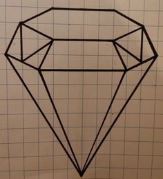 a drawing of a diamond on top of a piece of paper with lines drawn across it