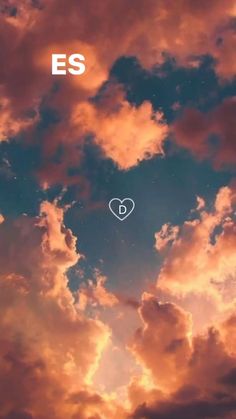 the sky is filled with clouds and there is a heart in the center that says ess