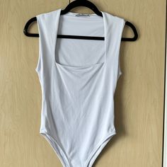 Stretchy Square Neck Bodysuit With Clips. Full Coverage Bottom. Never Worn. White Square Neck Bodysuit, Trendy Fitted Zara Bodysuit, Zara Fitted Casual Bodysuit, Zara Casual Fitted Bodysuit, Trendy Sleeveless Zara Bodysuit, Trendy Zara Sleeveless Bodysuit, Zara Trendy Sleeveless Bodysuit, Zara Summer Stretch Bodysuit, Zara White Fitted Bodysuit