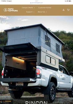 a truck with a camper attached to the back