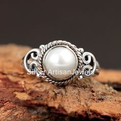 White Round Birthstone Ring For Promise, White Round Birthstone Promise Ring, White Birthstone Ring, Fine Jewelry Stackable Round Pearl Ring, Fine Jewelry Stackable Pearl Ring, Classic Rings With Stone Setting, Stackable Round Pearl Ring In Fine Jewelry Style, Silver Filigree Ring With Stone Setting, Elegant Silver Opal Toe Ring