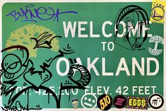 a green sign that says welcome to oakland