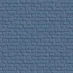 a blue brick wall textured with cement