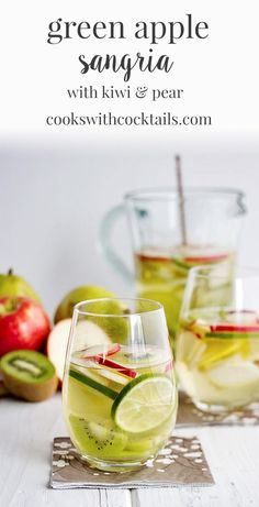 two glasses filled with green sangria next to apples