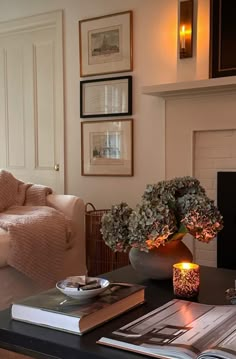 a living room filled with furniture and a fire place