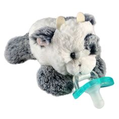 a stuffed animal with a pacifier in it's mouth