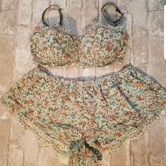 Green Lace Victoria's Secret Bra And Short Set With Flower Accents. Brand New With Tags, Never Worn. This Lace Is Exquisite And A Great Addition To Any Closet. Bra: 34d Shorts: Small 15% Off Bundles Of Two Items. Interested In More Than Two Items? Please Add Items To A Bundle For A Private Discount Offer. Victoria's Secret Underwire Sleepwear For Summer, Fitted Victoria's Secret Summer Sets, Victoria's Secret Summer Sleepwear, Victoria's Secret Fitted Summer Sets, Fitted Green Sleepwear With Lace Trim, Victoria's Secret Tops With Built-in Bra For Loungewear, Victoria's Secret Elegant Sleepwear With Built-in Bra, Victoria's Secret Feminine Sleepwear With Built-in Bra, Victoria's Secret Summer Floral Print Bra