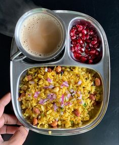 a tray with rice, beans and coffee on it