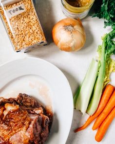 the meal is prepared and ready to be eaten, including carrots, celery