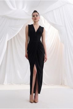 Pre-draped V-neck Maxi Dress For Cocktail, Pre-draped V-neck Cocktail Evening Dress, Sleek Fitted Draped Evening Dress, Black Draped Fitted Evening Dress, Black Draped Evening Dress For Party, Fitted Black Draped Evening Dress, Black Fitted Draped Evening Dress, Black Ruched Midi Dress For Gala, Evening V-neck Maxi Dress With Flattering Silhouette