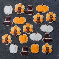 decorated cookies arranged in the shape of turkeys and pumpkins