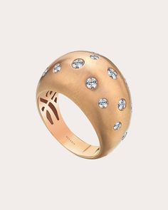 Drawing inspiration from the swirling beauty of the Milky Way, this 18-karat rose gold ring decorates its domed design with various sizes of shimmering white diamonds. From Mevaris’ Cosmos Collection, celestial creations that capture the timeless allure of lunar and stellar realms. 18k rose gold and diamond Diamond carat: 0.68 ctw Diamond color: G Diamond clarity: VS1 Polish with soft cloth Handmade in Turkey Measurements Band width: 0.19in Top width: 0.59in | Mevaris Women's Diamond Milky Way Ring in Rose Gold Size 5 Elegant Rose Gold Dome Ring With Diamond, Elegant Rose Gold Diamond Dome Ring, The Milky Way, Diamond Carat, Women Diamond, Diamond Color, Gold Diamond Rings, White Diamonds, Milky Way