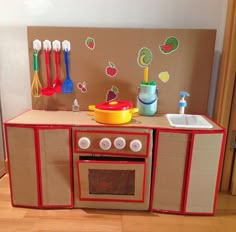 a play kitchen with lots of toys in it