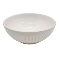 a white bowl sitting on top of a table