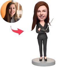 a custom bobble head with a woman holding a pair of scissors in her hand