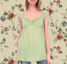 The most delicate and cute archive top in the style of the coquette Marie Antoinette in a soft pastel pistachio shade. Miss Sixty Collection Mint condition/New with tags! Babydoll silhouette Made in Portugal Size: tagged XS. The fabric is soft, delicate and stretches well.  90% viscose, 10% polyester 📦 Worldwide shipping with a tracking ID. Estimated delivery time is 2-3 weeks. Sometimes there may be delays in international post work, so please take this into account 🤍 Summer Coquette Camisole Top, Coquette Camisole Top For Summer, Summer Flirty Camisole Top, Sleeveless Coquette Tops For Daywear, Coquette Ruffled Tops For Spring, Spring Coquette Tops With Ruffles, Green Ruffled Tops For Daywear, Coquette Camisole Top For Daywear, Green Cottagecore Tops For Spring