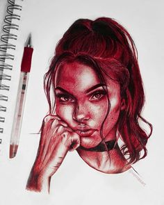 a pencil drawing of a woman with red hair