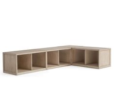 a wooden shelf with four compartments on each side