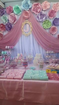 a table topped with lots of cake and desserts