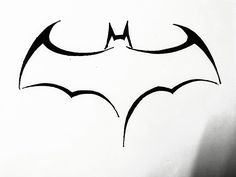 the batman symbol is drawn in black ink on white paper, and it appears to be painted