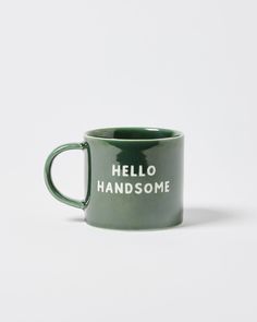 a green coffee mug with the words hello handsome on it's front and side