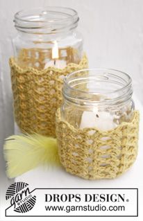 crocheted mason jars with candles in them on a white tablecloth and text that says drops design