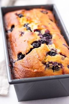 a loaf of blueberry bread in a pan