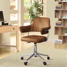 a brown office chair sitting on top of a wooden desk next to a book shelf