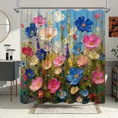 a shower curtain with flowers painted on it in a bathroom area next to a rug