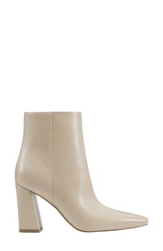 Boasting a clean-lined, sleek silhouette with a modern square toe and tapered block heel, this versatile leather bootie is a go-to cool-weather look. 3 1/2" heel(size 8.5) 4 3/4" shaft Leather upper/synthetic lining and sole Imported Chic Square Toe Boots With Heel Tab, Sleek Boots With Branded Heel Counter And Square Toe, Modern Calf Leather Boots With Block Heel, Sleek Square Toe Boots With Branded Heel, Modern Calf Leather Heeled Boots With Block Heel, Chic Boots With Branded Heel Counter And Square Toe, Chic Square Toe Boots With Branded Heel Counter, Modern Calf Leather Block Heel Boots, Chic Leather Boots With Branded Heel And Square Toe