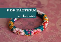 an image of a colorful bracelet on top of a pink background with the words pattern hanki written below it