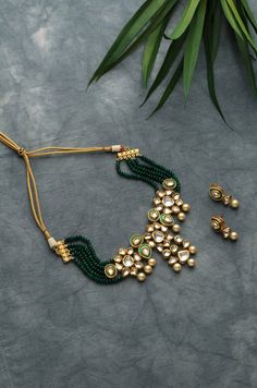 Green Gold Tone Kundan Inspired Necklace.This beautifully handcrafted necklace is a set of silver and copper alloy and plated with 22k gold. Elegant and modern, this kundan necklace will complete your lavish ensemble grandeur. Faux glass polki and shell pearls embellished Gold Plated Kundan Polki Bridal Indian Choker Necklace Set with Earrings highlighted with Green onyx tumble stones. Indian jewellery set, Indian Choker necklace set, Indian bridal jewellery, Indian wedding jewellery. Indian Nec Dual-tone Metal Kundan Necklace As Gift, Dual-tone Metal Kundan Necklace For Gift, Fusion Style Gold Jewelry Sets With Tilla, Fusion Gold Necklaces With Matching Earrings, Ceremonial Necklace Set With Earrings For Festivals, Ceremonial Festive Necklace With Matching Earrings, Hand Set Metal Kundan Necklace Gift, Gold Dual-tone Fusion Kundan Necklace, Fusion Style Gold Jewelry Sets With Pendant