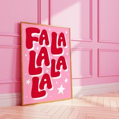 a pink poster with the words fala la la on it in front of a pink wall